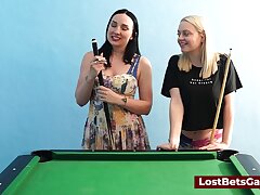 A ginormous tits all girl duo playing billiard and using the stick in a new way