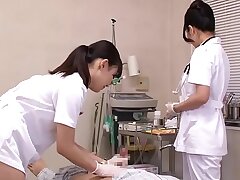 Asian Nurses Take Care Of Patients