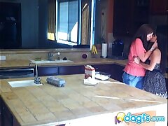 Horny milf munches teenager pussy in the kitchen