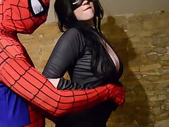 Big-chested Cosplay Catwoman takes spiderman web