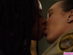 Ebony inmate slurps lesbian wardens pussy