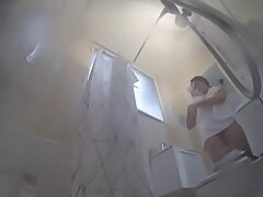 Natalia gets caught soaping her Giant TITS in the shower