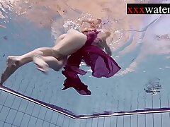 Smoking scorching Russian sandy-haired in the pool